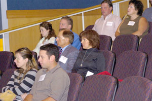 Alumni hear remarks from college leaders.