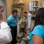 Participants monitor the materials grinding process.