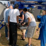 ... and loaded into the aircraft by her classmates