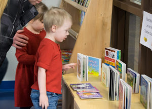 Children who attend the Dunham Children’s Learning Center at Pennsylvania College of Technology select books to take home and call their own during a Book Bingo event at the center. The books are purchased through a Keystone Stars grant.