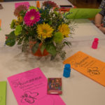 Colorful table accessories include bubble soap interactively incorporated by the speaker.