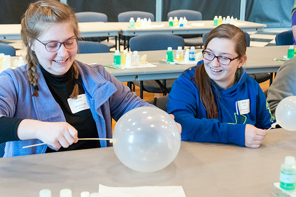 ... while teaching area Girl Scouts the science behind the magic.