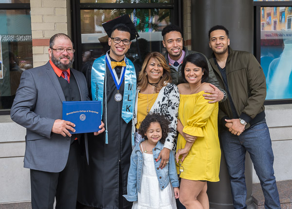 Wilmer I. Clase, a building science and sustainable design: architectural technology concentration student who found Penn College by way of the Dominican Republic, is all smiles with family.