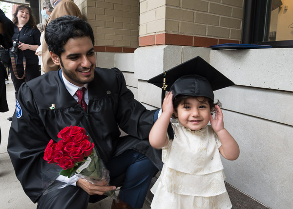 Even the prettiest of roses can't match this little beauty, enhancing the special day for Abdulaziz Saud Alomani, who earned a bachelor's degree in plastics and polymer engineering technology.