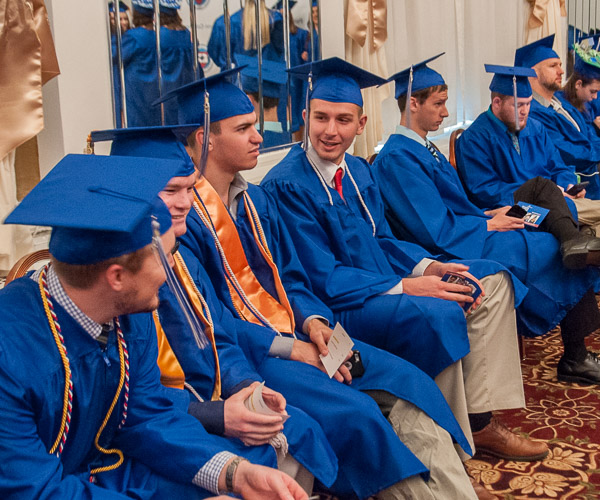 Saturday morning's graduates chat in The Genetti while waiting for the call to line up.