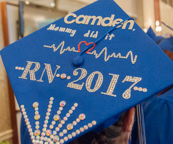 The cap of nursing grad McKenzie B. Romano, of Williamsport, spells a message to Romano’s son: “Mommy did it.”