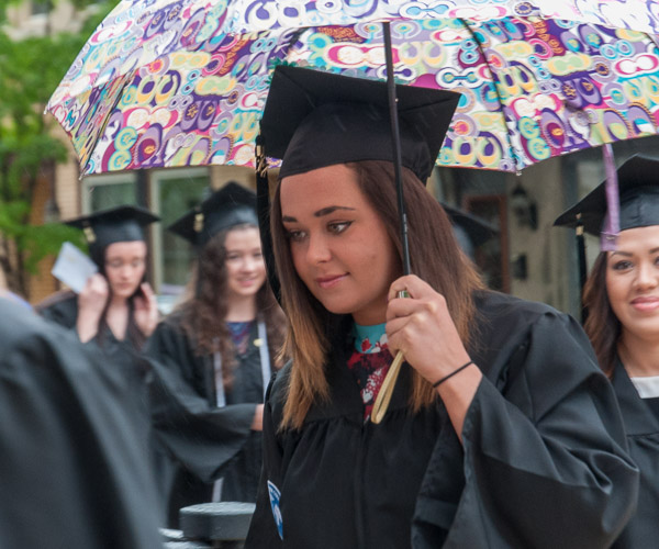 One of Saturday morning’s most coveted accessories: the umbrella.