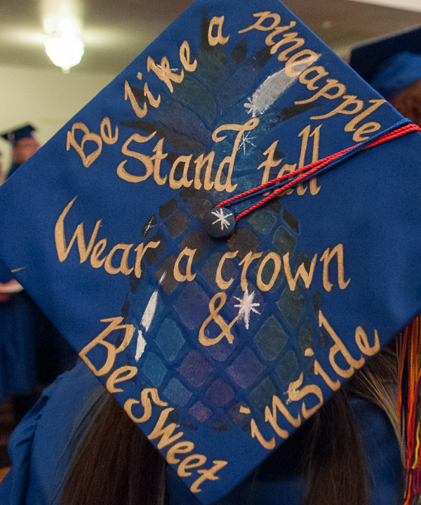 Baking and pastry arts grad Natascha G. Santaella’s cap reflects the pineapple, a symbol of hospitality.