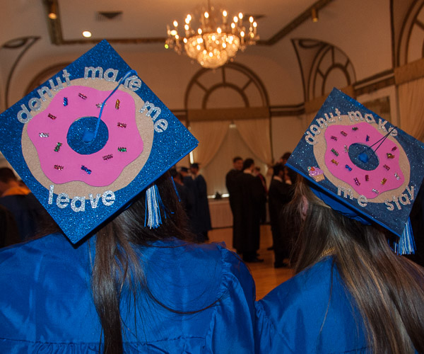 The caps of Andrea L. Solenberger, of Harrisburg, and Alexis L. Kepley, of Reading, both baking and pastry arts students, reflect the mixed emotions of the day: “Donut make me leave,” and “Donut make me stay.”