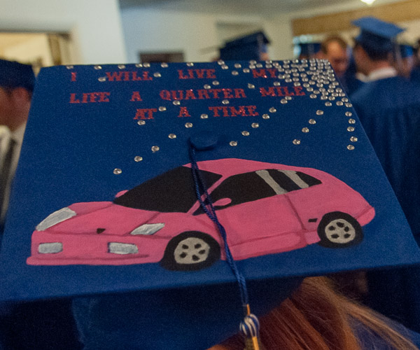 Hunter A. Fuoti, a collision repair technology grad from Blandon, adds a touch of pink to her attire with a painted Lamborghini.