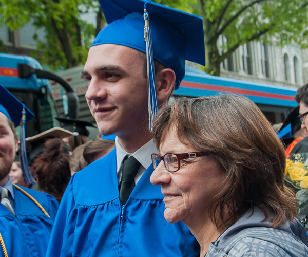 Weston J. Sheehan, an automotive technology grad from Renovo, shares the moment with his mom.