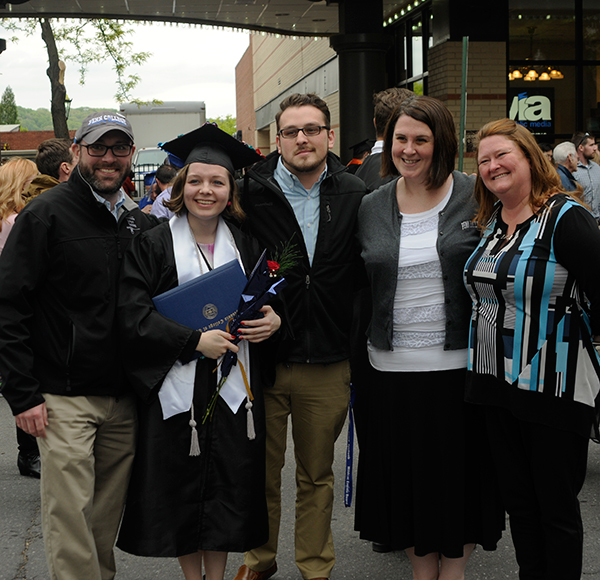 Student leader Morgan N. Keyser, a co-recipient of the President's Award connects with her Student Affairs family outside the theater. From left are Sal Vitko, assistant director of student activities for student organizations/orientation; Anthony J. Pace, director of student activities; Allison A. Bressler, assistant director of student activities for programming and Greek life; and Shelley L. Moore, director of career services.