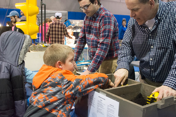 Construction management instructor Brad M. Martin (right) and student Tylor C. Oravec have as much fun 