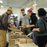 Penn College student Joe J. Hetrick, of Painted Post, N.Y., staffs another of the stops on the interactive instructional tour.