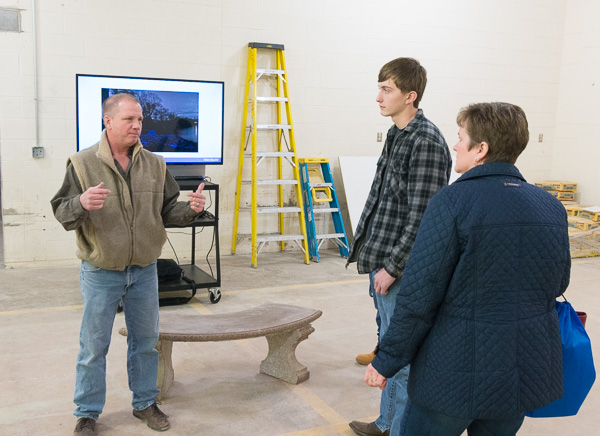 Franklin H. Reber, instructor of building construction technology, tells a prospective student about the industry demand for concrete specialists. The college will welcome its first group of concrete science technology students in the fall.