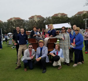 Dressed to impress, a Penn College entourage accompanies "Tommy" on his award-winning trip to Florida.