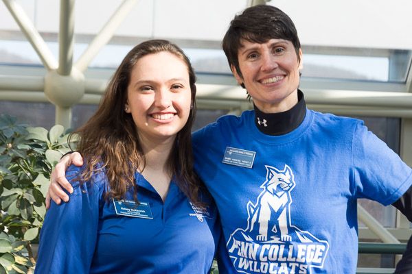 Dental hygiene student Kelsey L. McKenrick, of Gilbertsville, and Bambi A. Hawkins, learning lab coordinator for the paramedic program, greet and direct visitors to health sciences and information technology.