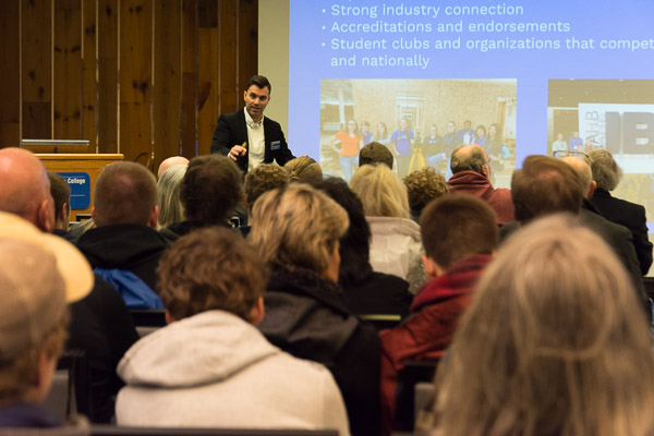 Naim N. Jabbour, assistant professor of architectural technology, connects with students during the Construction & Design Technologies school information session.