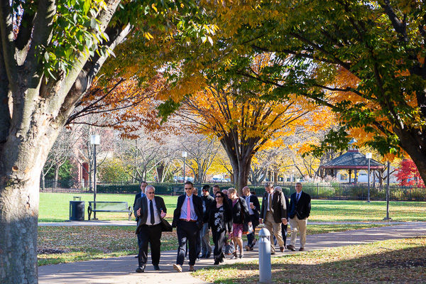 The entourage make its way across a foliage-filled campus led by Tom F. Gregory (left), associate vice president for instruction, and John E. Guyer, executive director, Pennsylvania Senate Appropriations Committee.