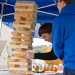 Giant Jenga requires dexterity and a keen eye to dislodge just the right block ...