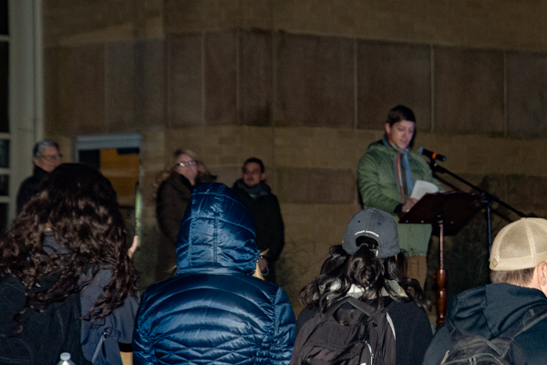 Student Government Association President Everett B. Appleby addresses the bundled-up crowd.