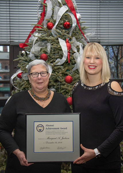 Penn College President Davie Jane Gilmour (left) presented the Alumni Achievement Award to Margaret A. Jackson at the college’s Fall 2018 commencement ceremony Dec. 22.