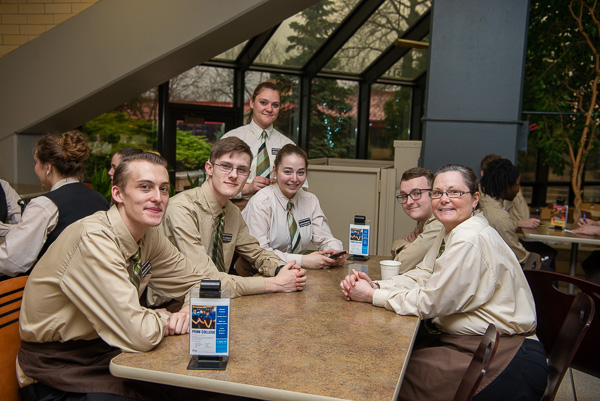 All dressed up with somewhere very important to go! Students await the pre-dinner “pep talk.”