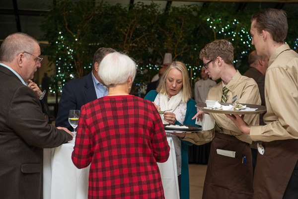 A guest selects an appetizer during the reception. 