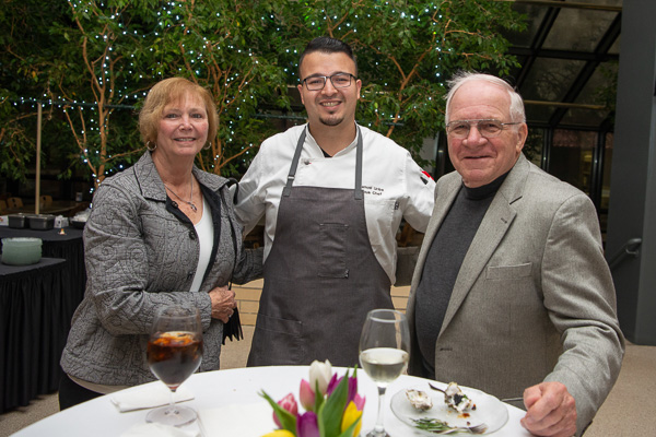 Uribe joins Suzie and Daniel R. Hawbaker in a photo. 