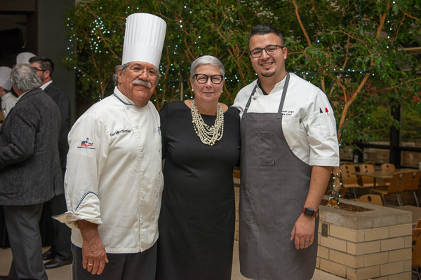 President Davie Jane Gilmour pauses for a photograph with Chef Michael J. Ditchfield (left), hospitality management/culinary arts instructor, and Visiting Chef Uribe. 