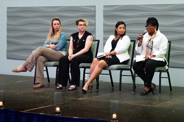 The speakers sit for a Q&A with audience members ...