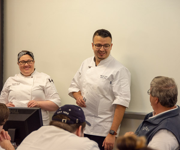 Chefs Erceg and Uribe join Chef Paul Mach, assistant professor of hospitality management/culinary arts, in the classroom, where they reviewed the menu and wine pairings, and offered sage career advice.