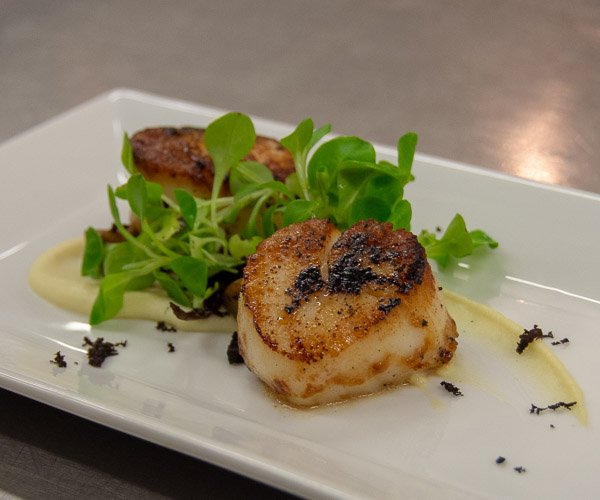 … seared sea scallops with brown butter, chanterelle mushrooms and truffles.