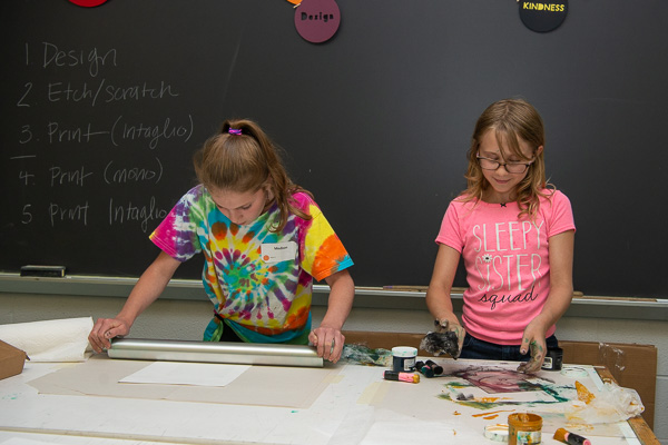 Creative Art Campers engage in intaglio printmaking techniques.