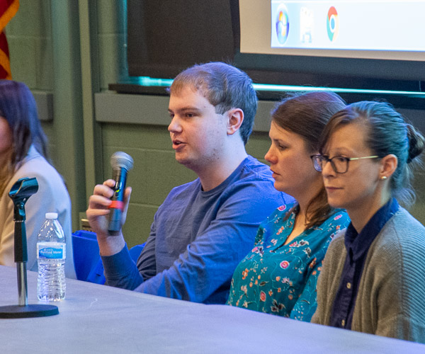 Benjamin J. Weaver, an accounting student from Williamsport, answers a question as part of a student panel at the accounting and business careers event. From left are Weaver and fellow accounting students Michelle D. Thomas, of South Williamsport, and Emily J. Jones, of Avis.