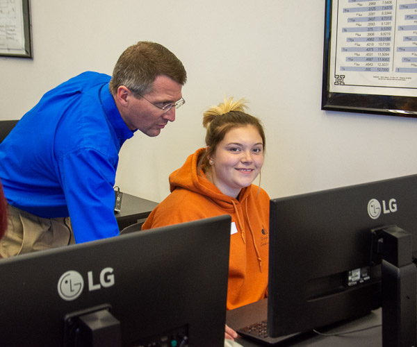 Miller provides assistance to a Lycoming Career & Technology Center student.