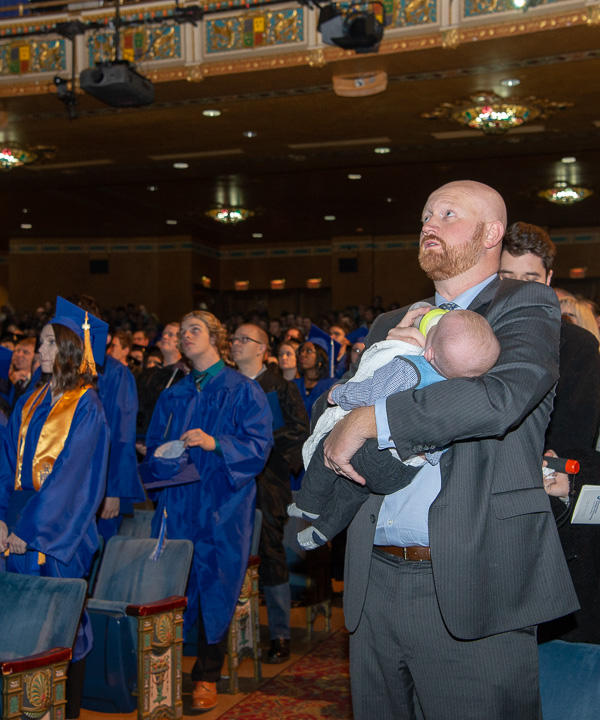 Deftly juggling responsibilities, Cullison joins his fellow alumni in rising to sing the Penn College alma mater. 