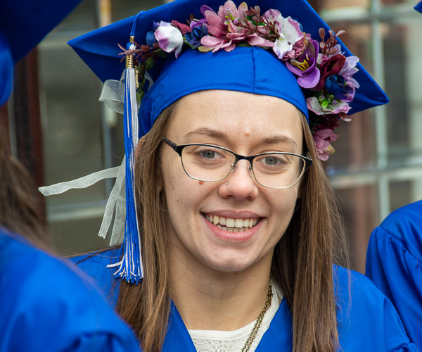 Oceana R. Copley, landscape/horticulture technology: plant production emphasis, appropriately decorates her cap with flora.