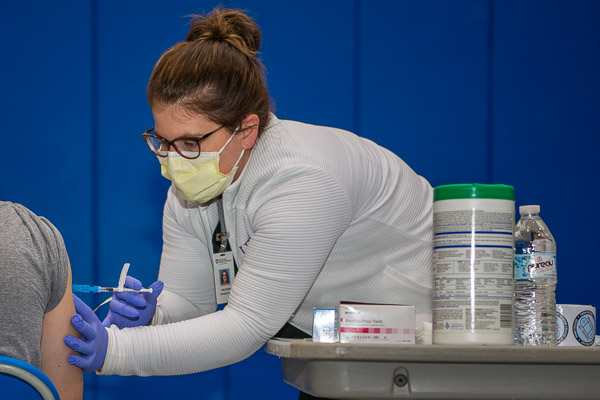 Holly N. Shadle, part-time nursing/practical nursing faculty, lends a steady hand to the all-campus effort. 