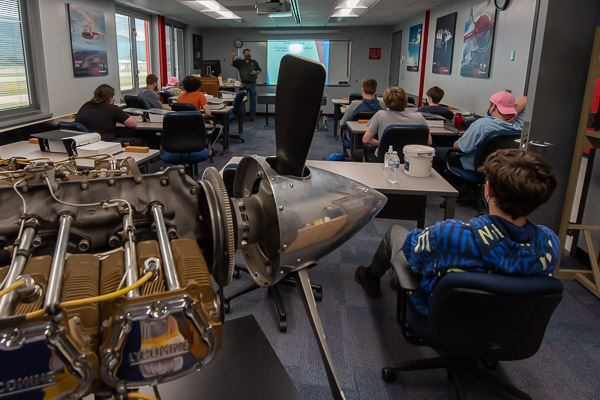 Michael Damiani, instructor of aviation maintenance, aligns his presentation with the venue: the Lycoming Engines classroom at the Lumley Aviation Center.