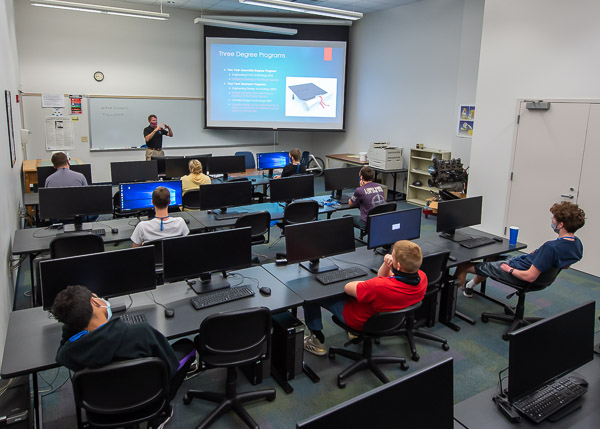 The world of engineering design, as well as the world that such a degree will open, is imparted in a CAD lab by Craig A. Miller, instructor and department head of engineering and industrial design technology.