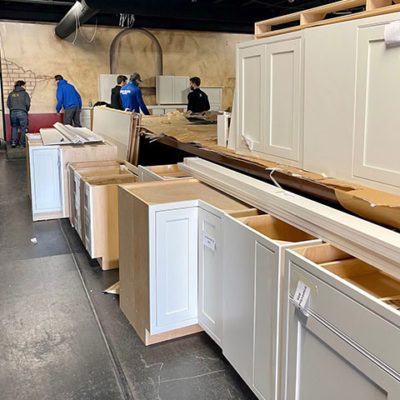 Cabinetry gets a showroom spiffing-up, thanks to selfless and eager students giving up a piece of their weekend.