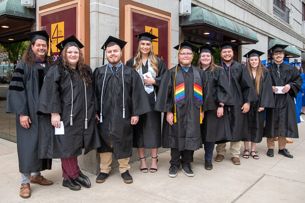 First in line for Friday’s festivities are human services & restorative justice graduates accompanied by Craig A. Miller (far left), associate professor of history/political science. 