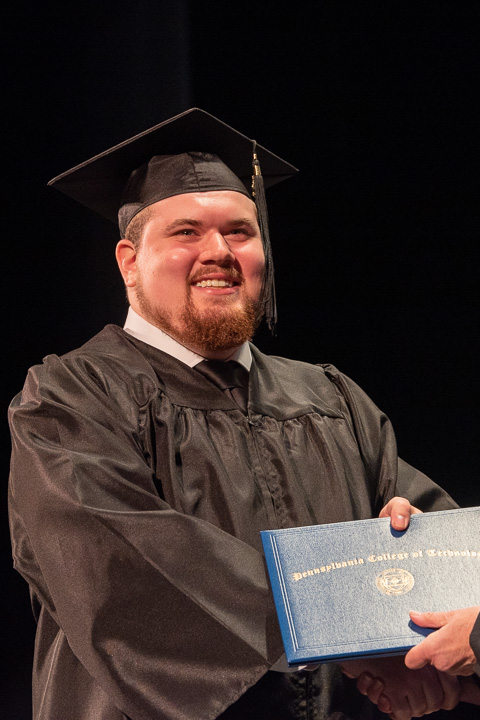 Eric V. Trischitta, who earned a bachelor's in welding & fabrication engineering technology, is joy personified.