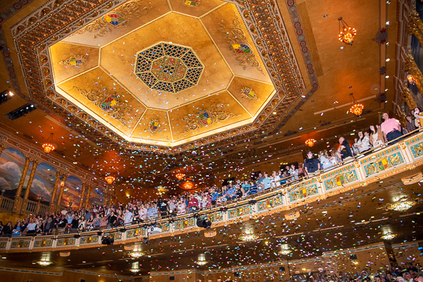 Confetti cascades across the house ...