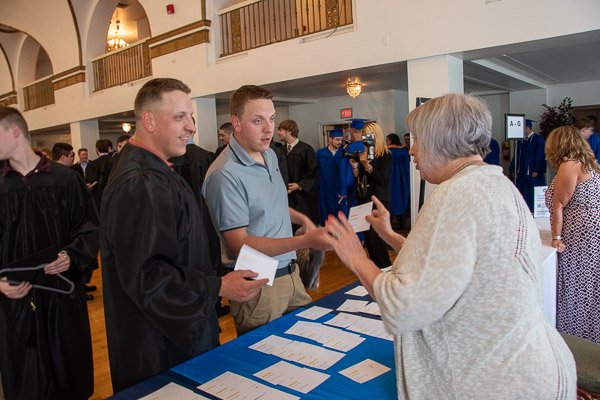 Twins John T. and Stephen T. Lang, of Mercer, earning degrees in residential construction technology & management, tease graduation assistant Karen E. Wright, graduation assistant – not the first time they’ve tried to confuse her.