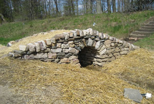 The dry-stone 'Transition Bridge,' built by alumni artisan James A. Asbury and Pennsylvania College of Technology students and faculty, adorns the Schneebeli Earth Science Center near Allenwood.