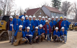 Pennsylvania College of Technology students who volunteered for an 'Extreme Makeover%3A Home Edition' construction project pause for a group photo during the flurry of activity at the Franklin County work site.