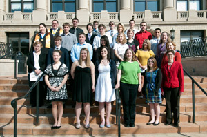 The newest members of Phi Theta Kappa's Beta Epsilon Upsilon Chapter join their advisers for a commemorative photo on the steps of the Klump Academic Center