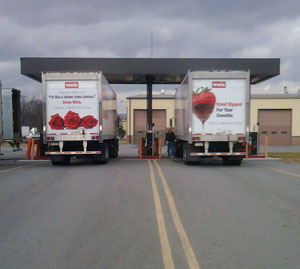 Trisha Herrick's designs adorn these Weis Markets trucks, being prepped for deliveries throughout the chain's network of supermarkets.